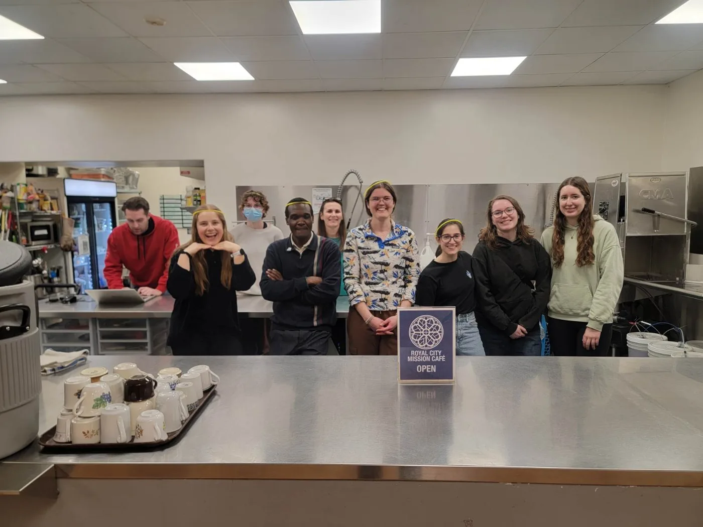 Volunteers behind the Royal City Mission Cafe counter