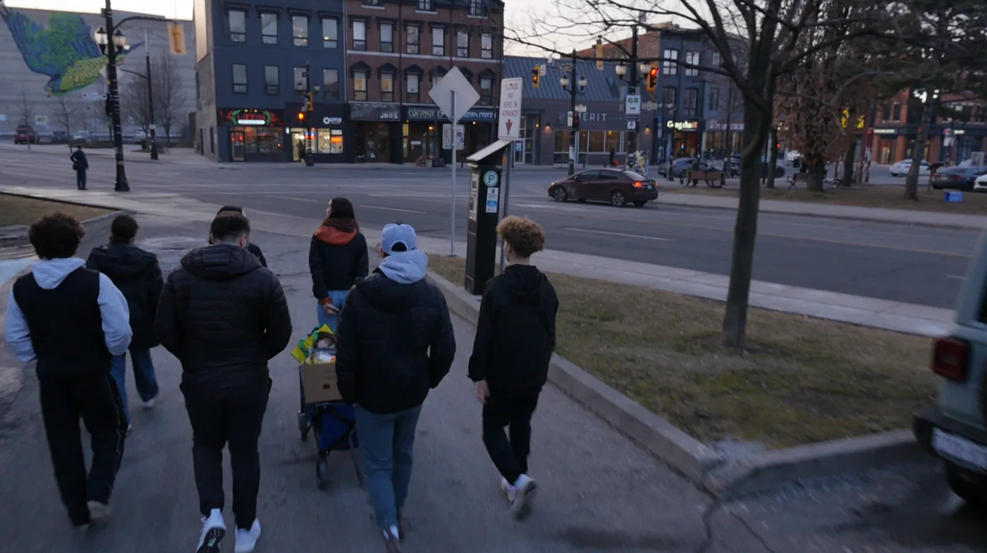 Walking downtown with a wagon of supplies